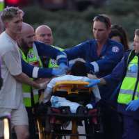 Gunmen kill at least 16 people in attack on Hanukkah celebration on Sydney's Bondi Beach