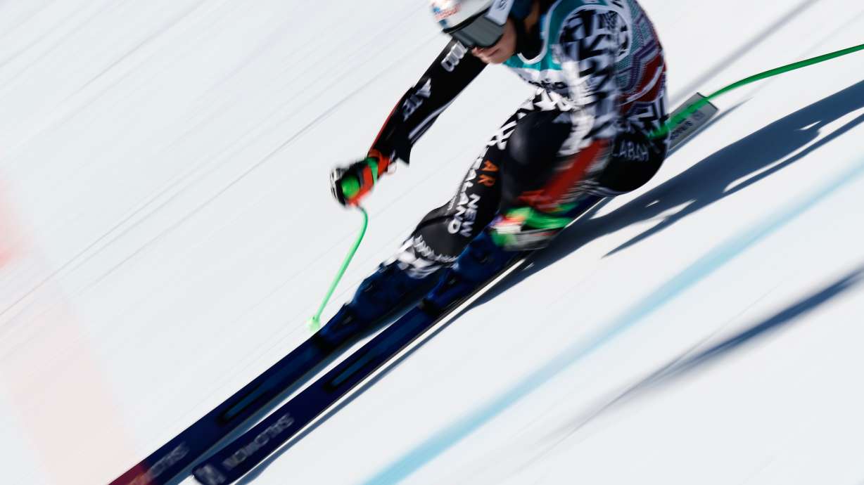 New Zealand's Alice Robinson speeds down the course during an alpine ski, women's World Cup super-G event, in St. Moritz, Switzerland, Sunday Dec. 14, 2025.