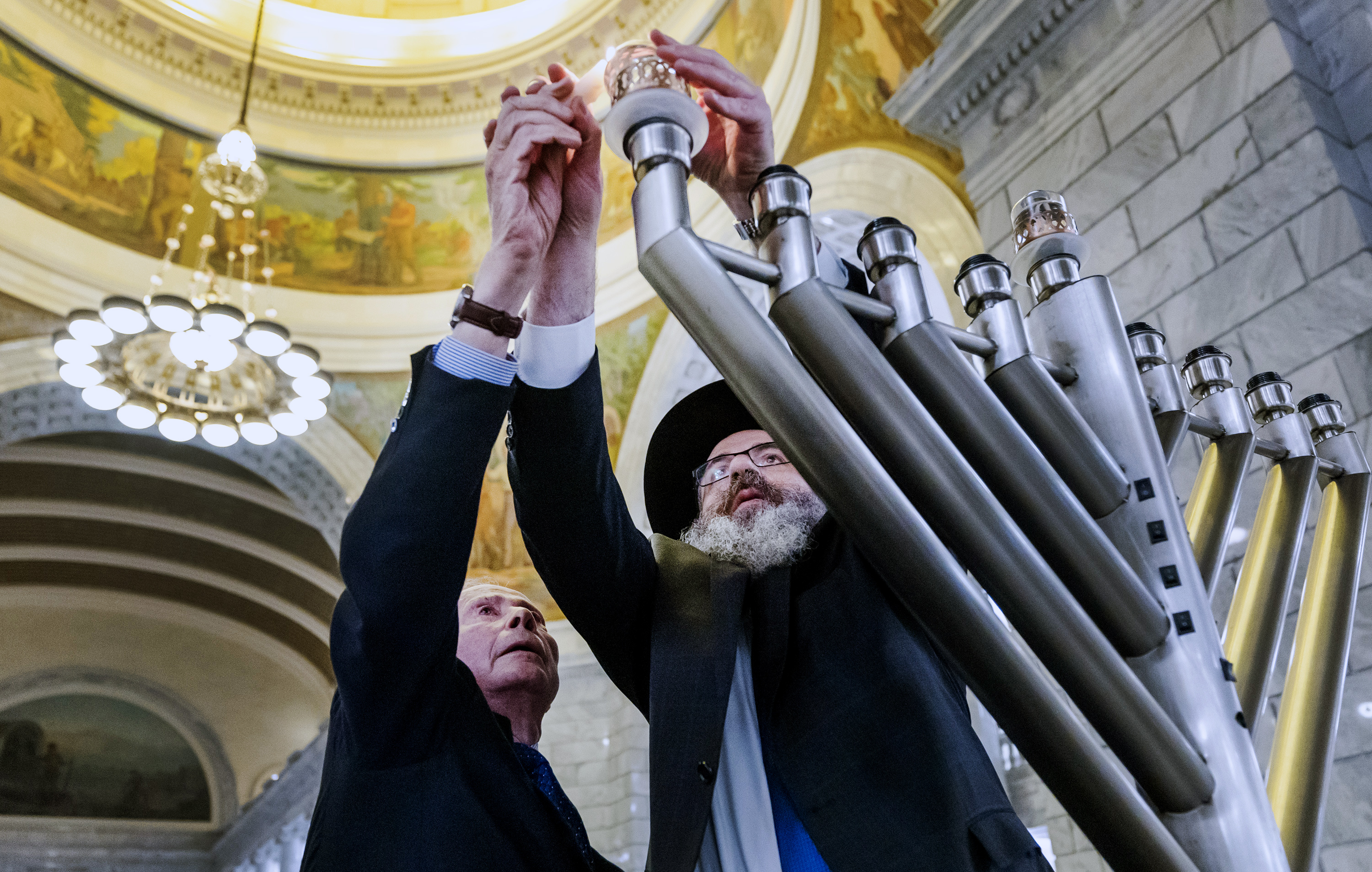 Hanukkah celebration proceeds as Utah rabbis say they 'will not give in to terror'
