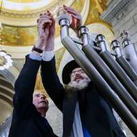 Hanukkah celebration proceeds as Utah rabbis say they 'will not give in to terror'