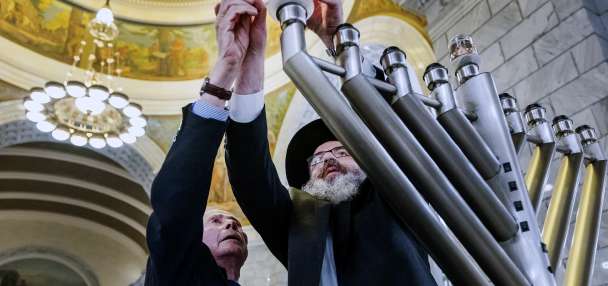 Hanukkah celebration proceeds as Utah rabbis say they 'will not give in to terror'