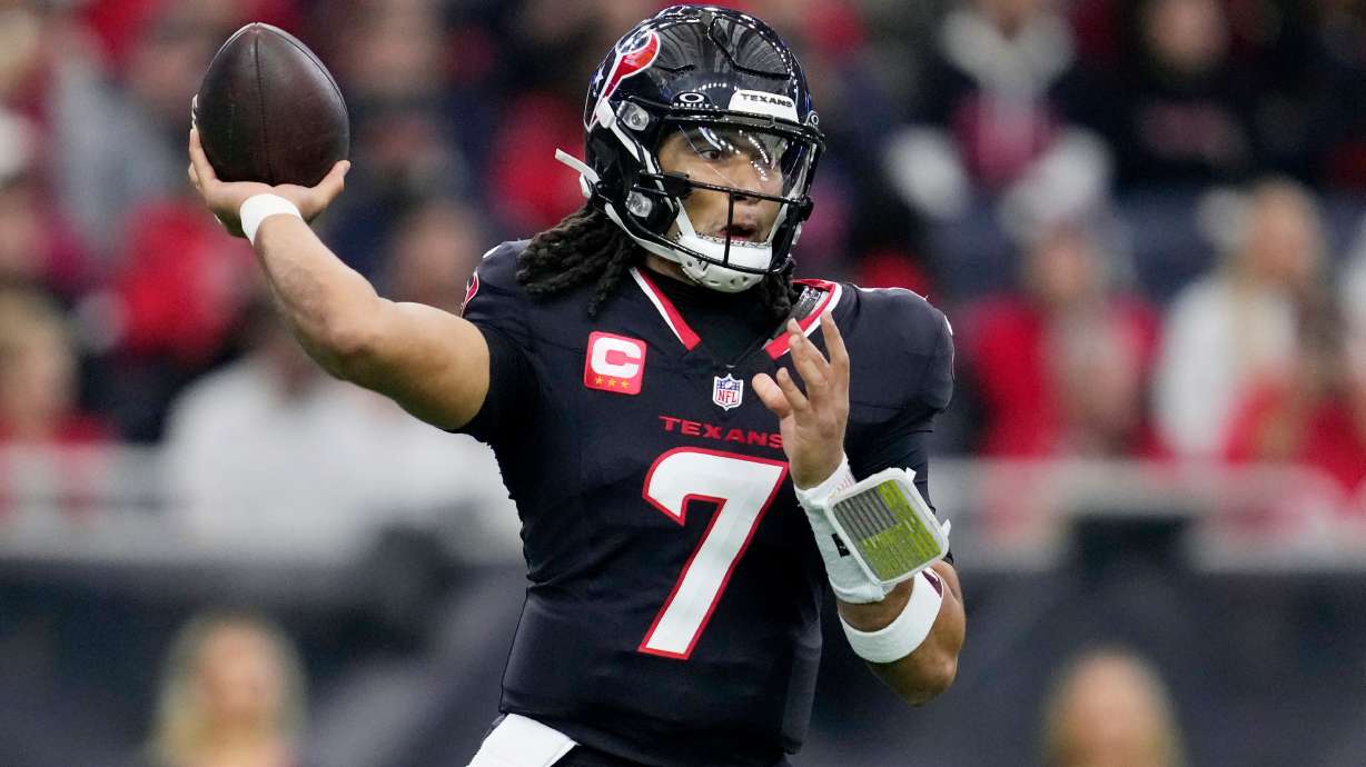 Houston Texans quarterback C.J. Stroud throws against the Arizona Cardinals during the first half of an NFL football game Sunday, Dec. 14, 2025, in Houston.