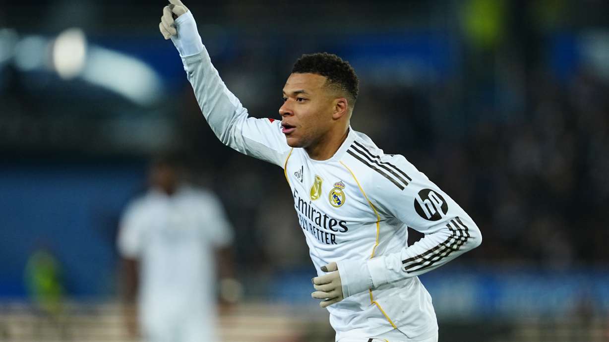 Real Madrid's Kylian Mbappe celebrates after scoring the opening goal during the Spanish La Liga soccer match between Alaves and Real Madrid in Vitoria-Gasteiz, Spain, Sunday, Dec. 14, 2025.