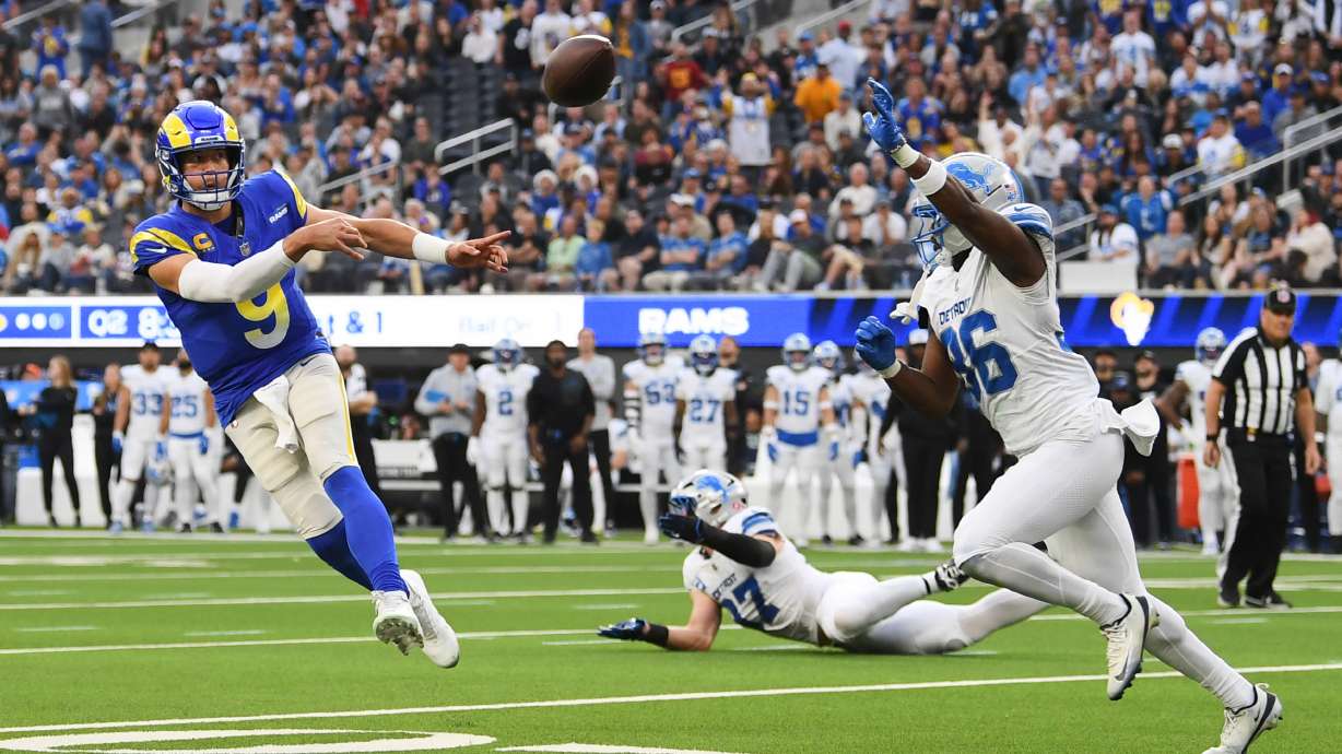 Los Angeles Rams quarterback Matthew Stafford (9) throws a pass during the first half of an NFL football game against the Detroit Lions, Sunday, Dec. 14, 2025, in Inglewood, Calif.