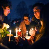 Search for the Brown University shooter resumes as questions swirl about campus security