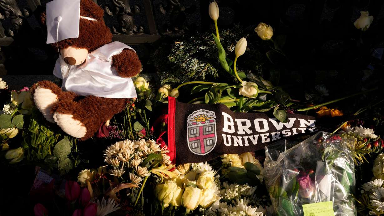 A makeshift memorial on the campus of Brown University, close to from the scene of the shooting, Monday, in Providence, R.I. Two people were killed and nine others wounded there Saturday by a gunman.