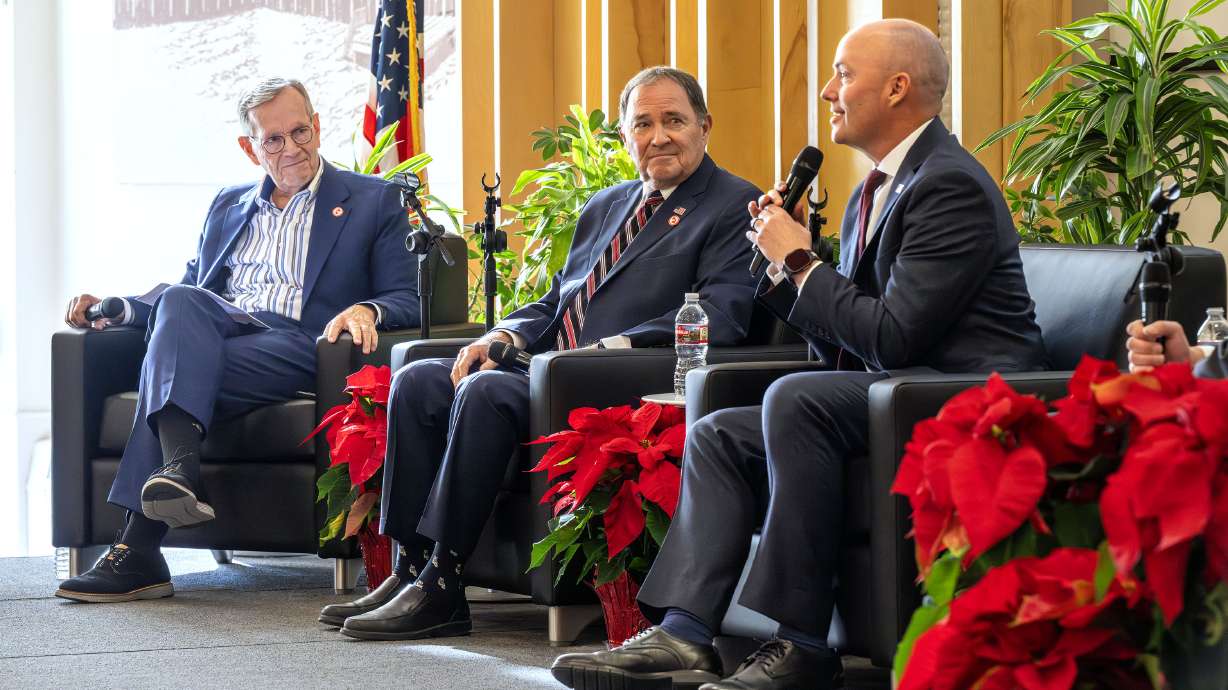 Former Utah Govs. Mike Leavitt and Gary Herbert join current Gov. Spencer Cox on stage to discuss a wide-ranging number of topics, including leadership and the future of the state, at the University of Utah’s Union Building in Salt Lake City on Monday.