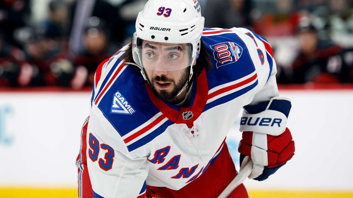 New York Rangers' Mika Zibanejad watches the puck against the Carolina Hurricanes during the first period of an NHL hockey game in Raleigh, N.C., Wednesday, Nov. 26, 2025.