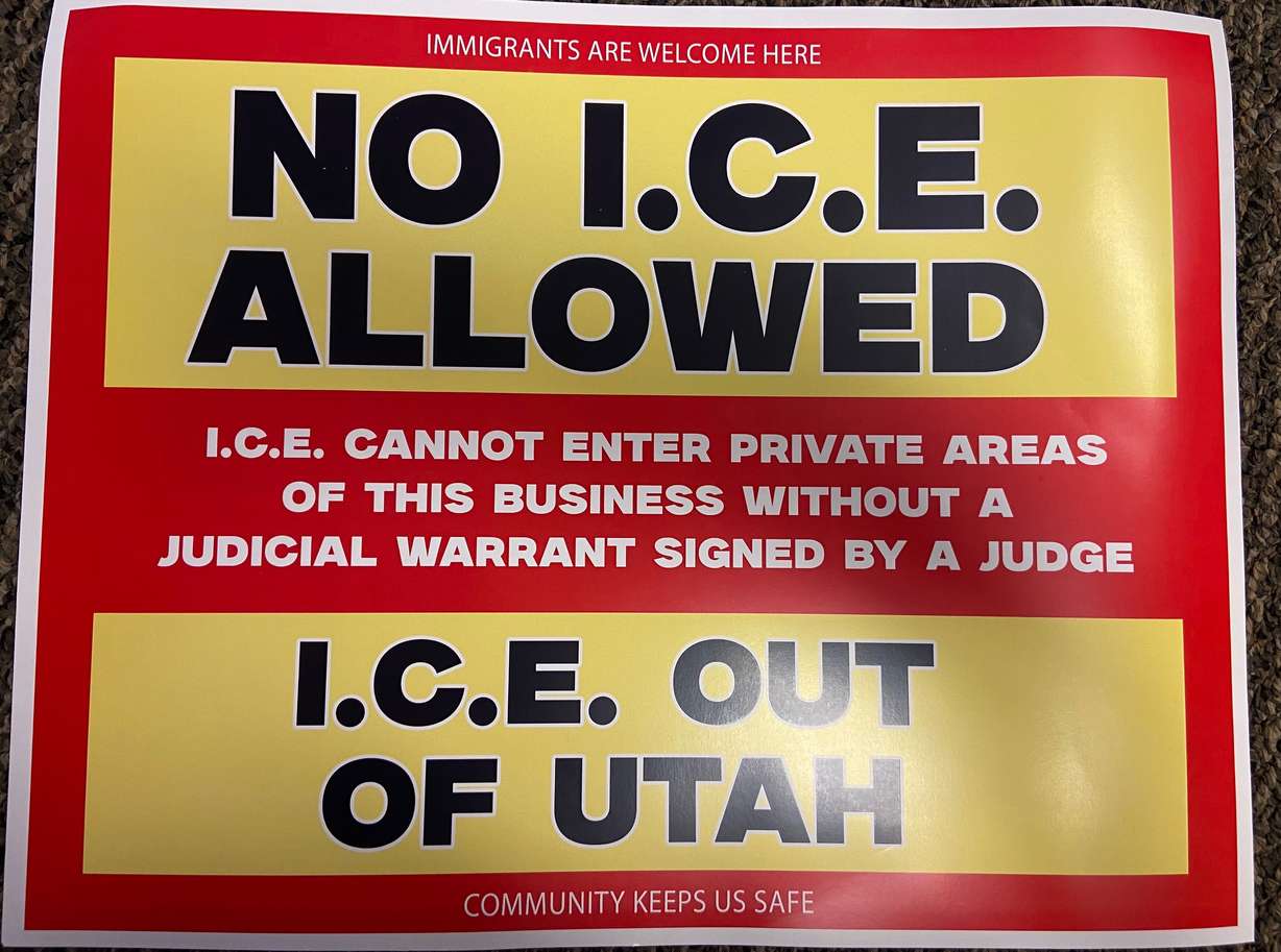 Comunidades Unidas is helping spearhead a sign-distribution effort meant to show support for immigrants and opposition to the Immigration and Customs Enforcement crackdown on illegal immigration. The group is distributing signs like the one shown in the photo.