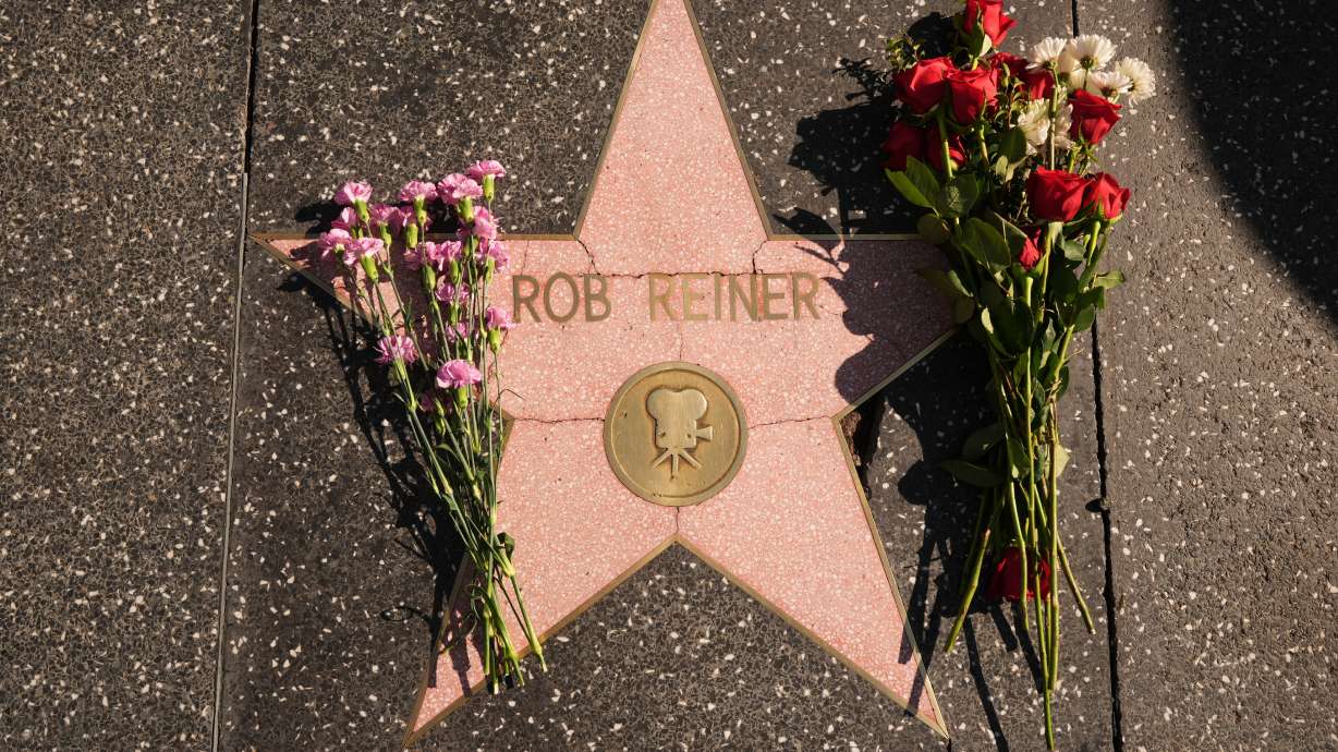 Flowers cover the Walk of Fame star for Rob Reiner Monday, in the Hollywood section of Los Angeles.