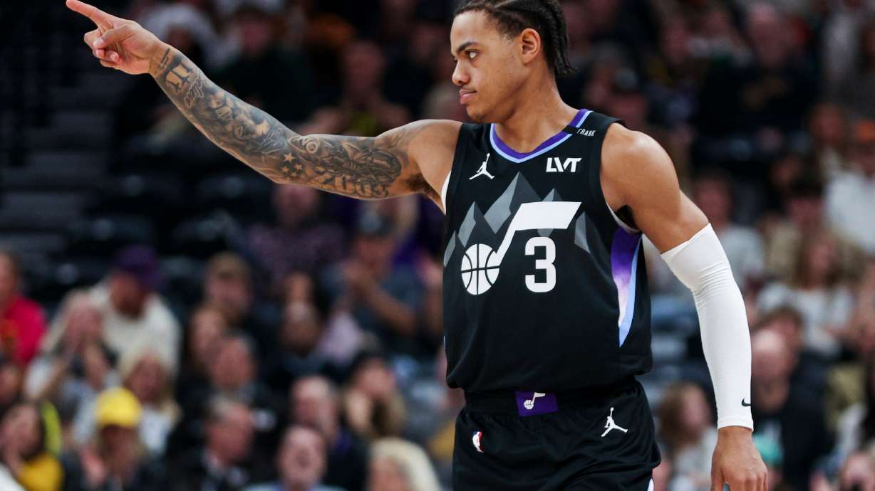Utah Jazz guard Keyonte George (3) reacts after making a 3-pointer during the first half of an NBA game against the Dallas Mavericks at the Delta Center in Salt Lake City on Monday, Dec. 15, 2025.
