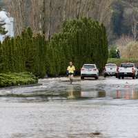 Damage from record flooding in Washington state is profound; more on the way, governor says
