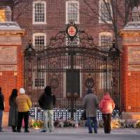 Police fan out to Providence schools to calm worries with the Brown University shooter still loose