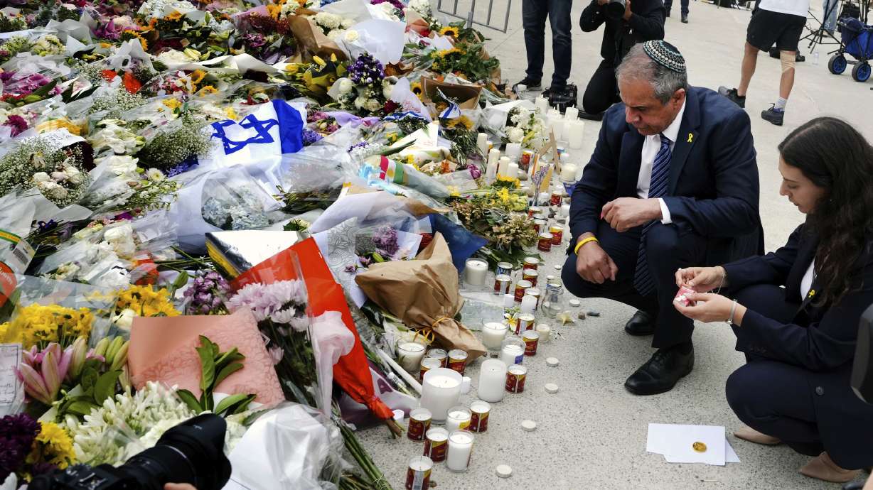 Israeli Ambassador to Australia Amir Maimon, pauses to pay his respects at a floral memorial at the Bondi Pavilion at Bondi Beach on Tuesday, Dec. 16, 2025, following Sunday's shooting in Sydney, Australia.
