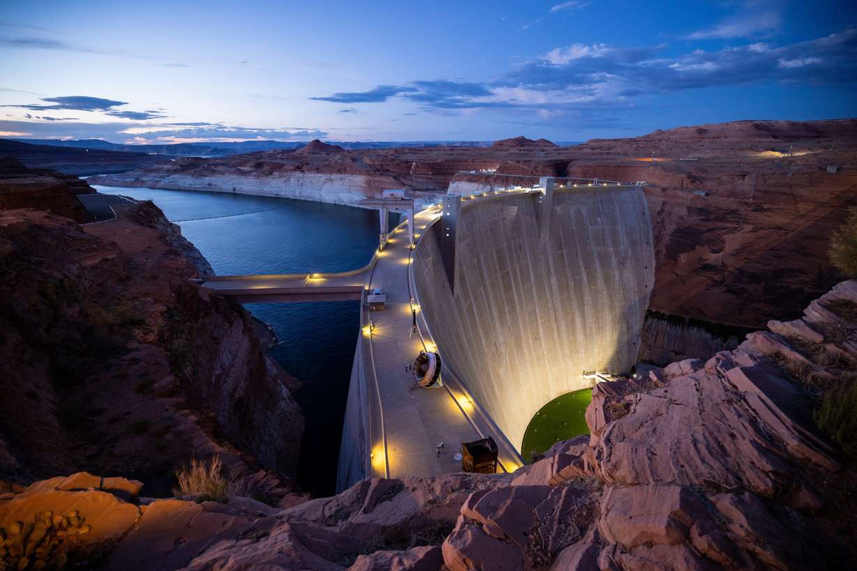 Glen Canyon Dam holds back Lake Powell in Page, Ariz., on Monday, July 18, 2022.
