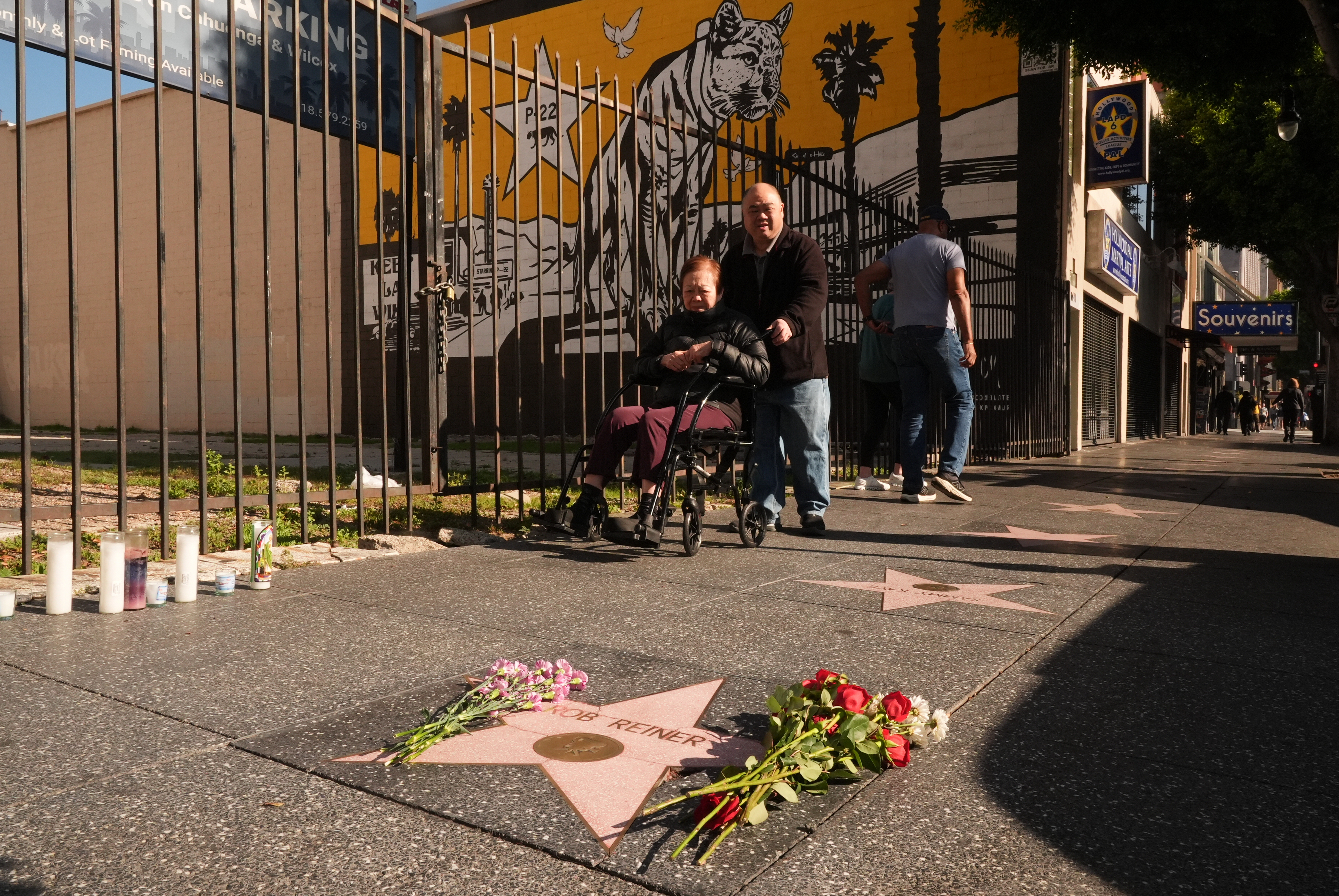 Flowers cover the Walk of Fame star for Rob Reiner, Monday, in the Hollywood section of Los Angeles. Reiner's son was charged with two counts of first-degree murder on Tuesday, prosecutors announced.
