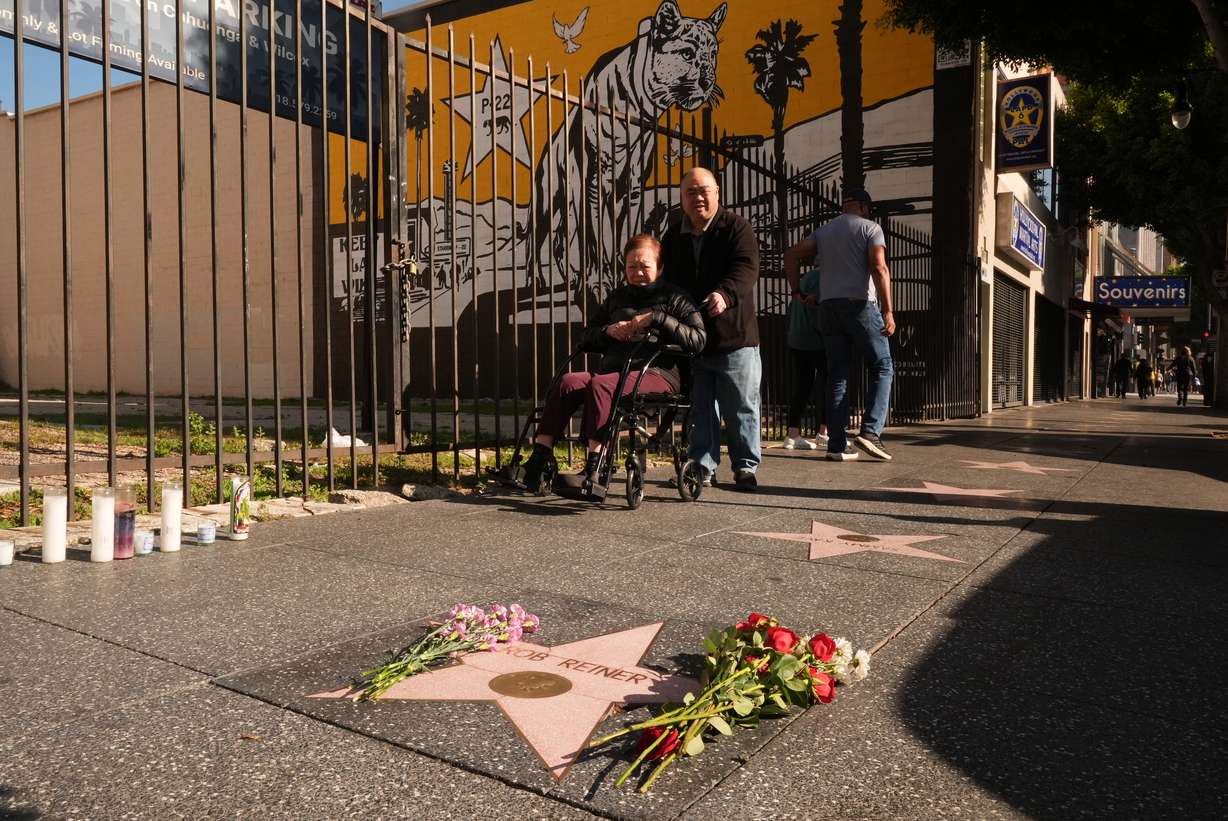 Flowers cover the Walk of Fame star for Rob Reiner, Monday, in the Hollywood section of Los Angeles. Reiner's son was charged with two counts of first-degree murder on Tuesday, prosecutors announced.