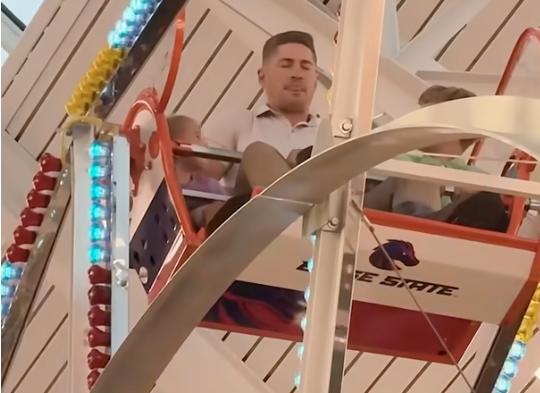 Dad takes one for the team at Scheel's in Meridian, Idaho, on Nov. 1.