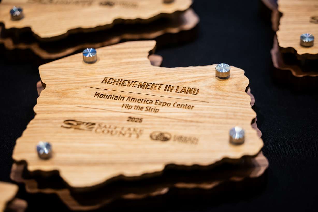 An Achievement in Land award lays on a table during Salt Lake County’s inaugural Sustainability Achievement Awards at the Salt Lake County Council Chambers in Salt Lake City on Tuesday.