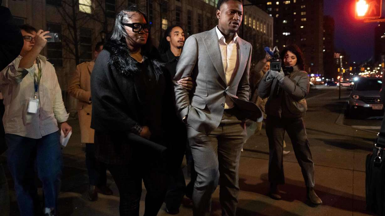 Miami Heat's Terry Rozier, right, leaves Brooklyn federal court, Monday, Dec. 8, 2025, in New York.
