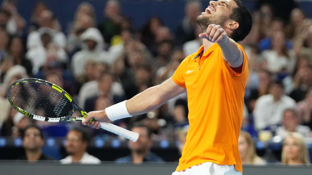 Carlos Alcaraz reacts after winning the first set against Joao Fonseca during the Miami Tennis Invitational tournament, Monday, Dec. 8, 2025, in Miami.