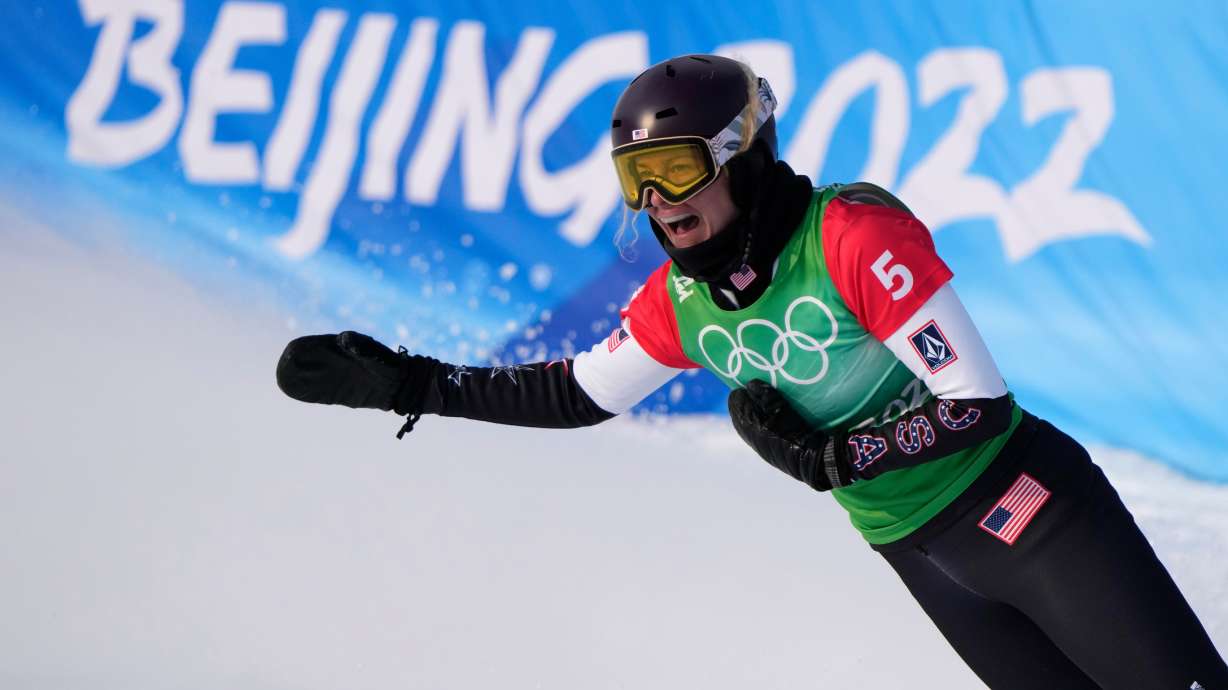 FILE - United States' Lindsey Jacobellis celebrates after winning a gold medal in the women's cross at the 2022 Winter Olympics, Feb. 9, 2022, in Zhangjiakou, China.