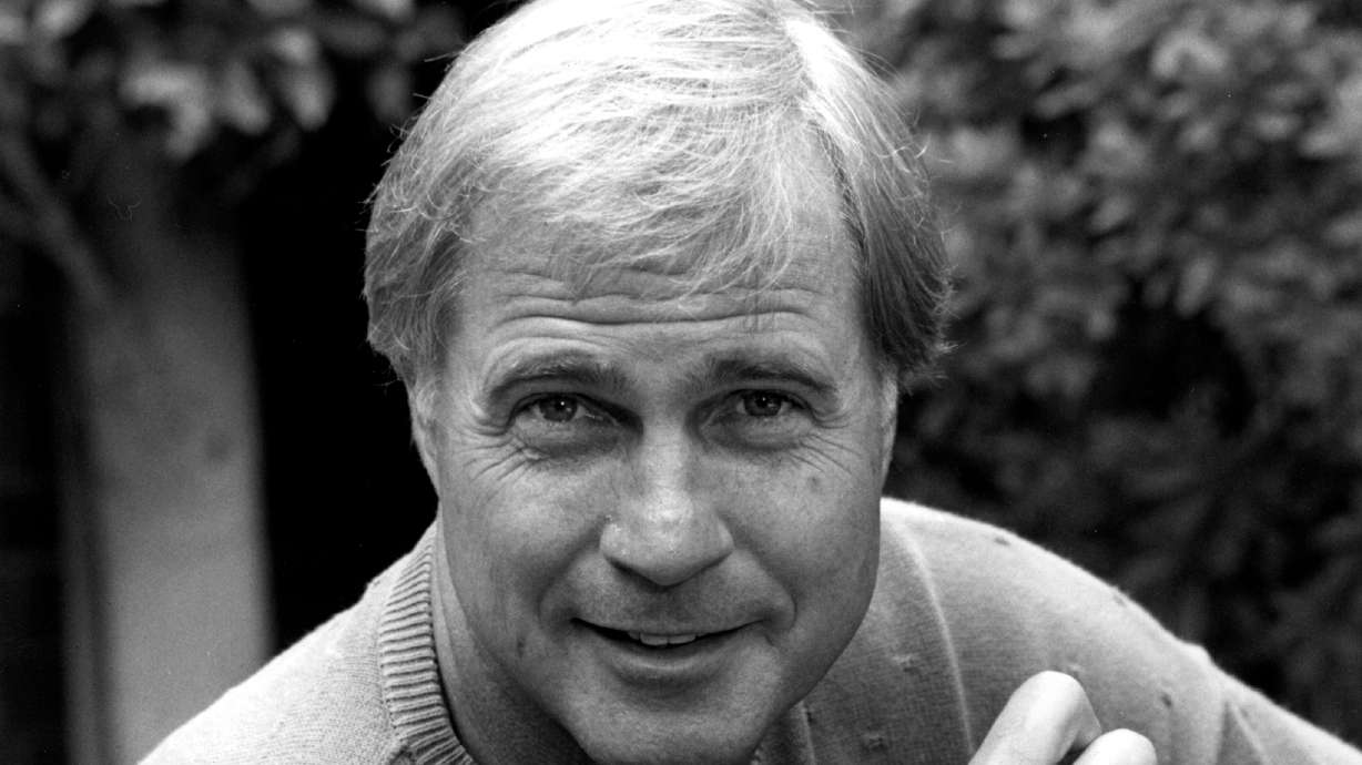 Actor Gil Gerard poses in Los Angeles, Calif., on July 16, 1990. Gerard died on Tuesday at the age of 82.