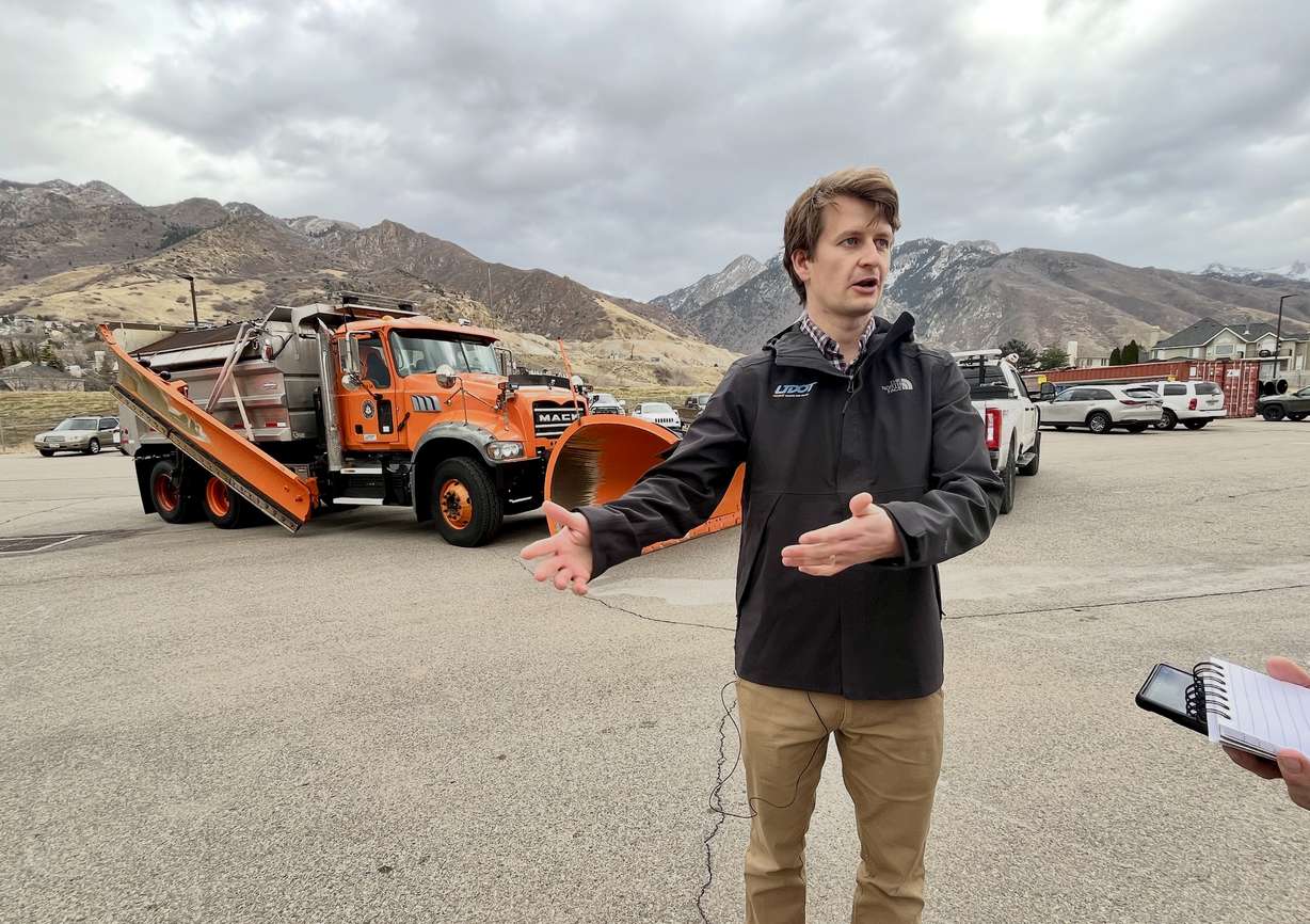 Devin Weder, a project manager for the Utah Department of Transportation, speaks to reporters at a UDOT maintenance facility in Cottonwood Heights on Wednesday.