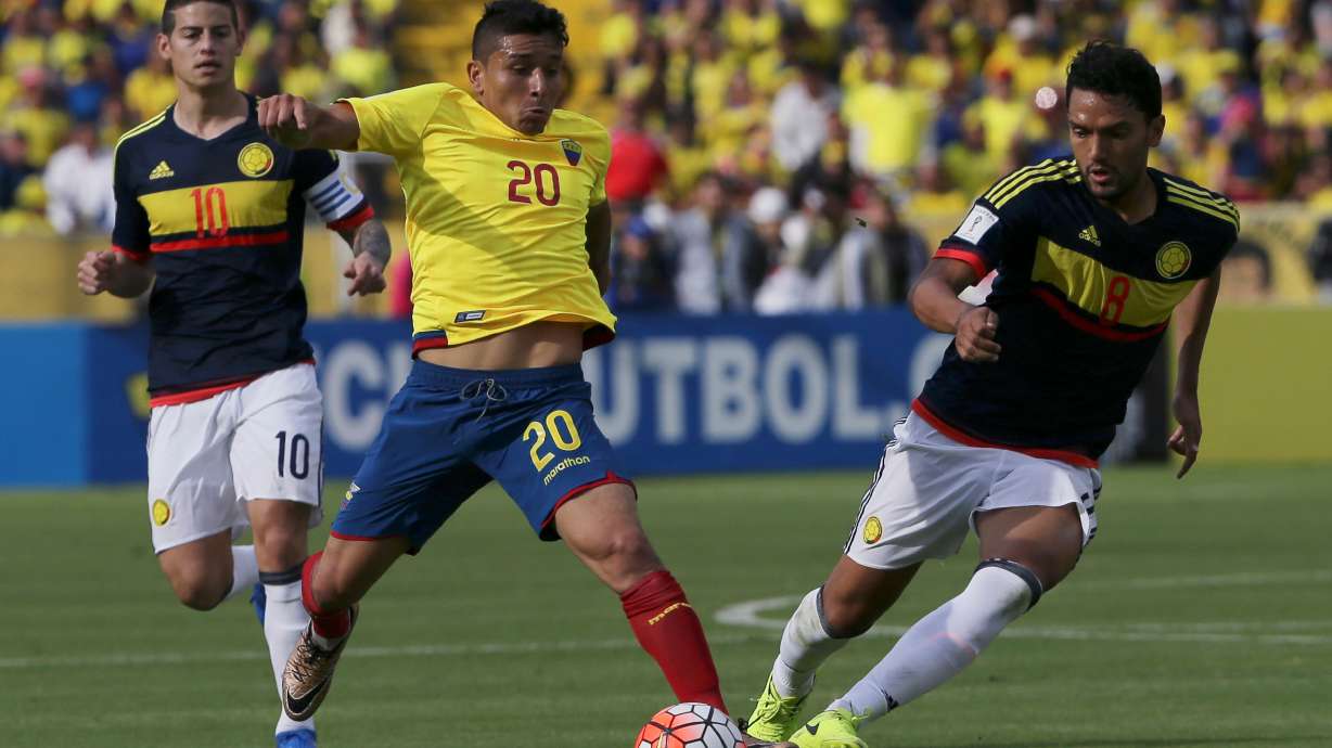 FILE - Ecuador's Mario Pineida, center, and Colombia's Abel Aguilar battle for the ball during their 2018 World Cup qualifying soccer match at the Atahualpa Olympic Stadium in Quito, Ecuador, March 28, 2017.