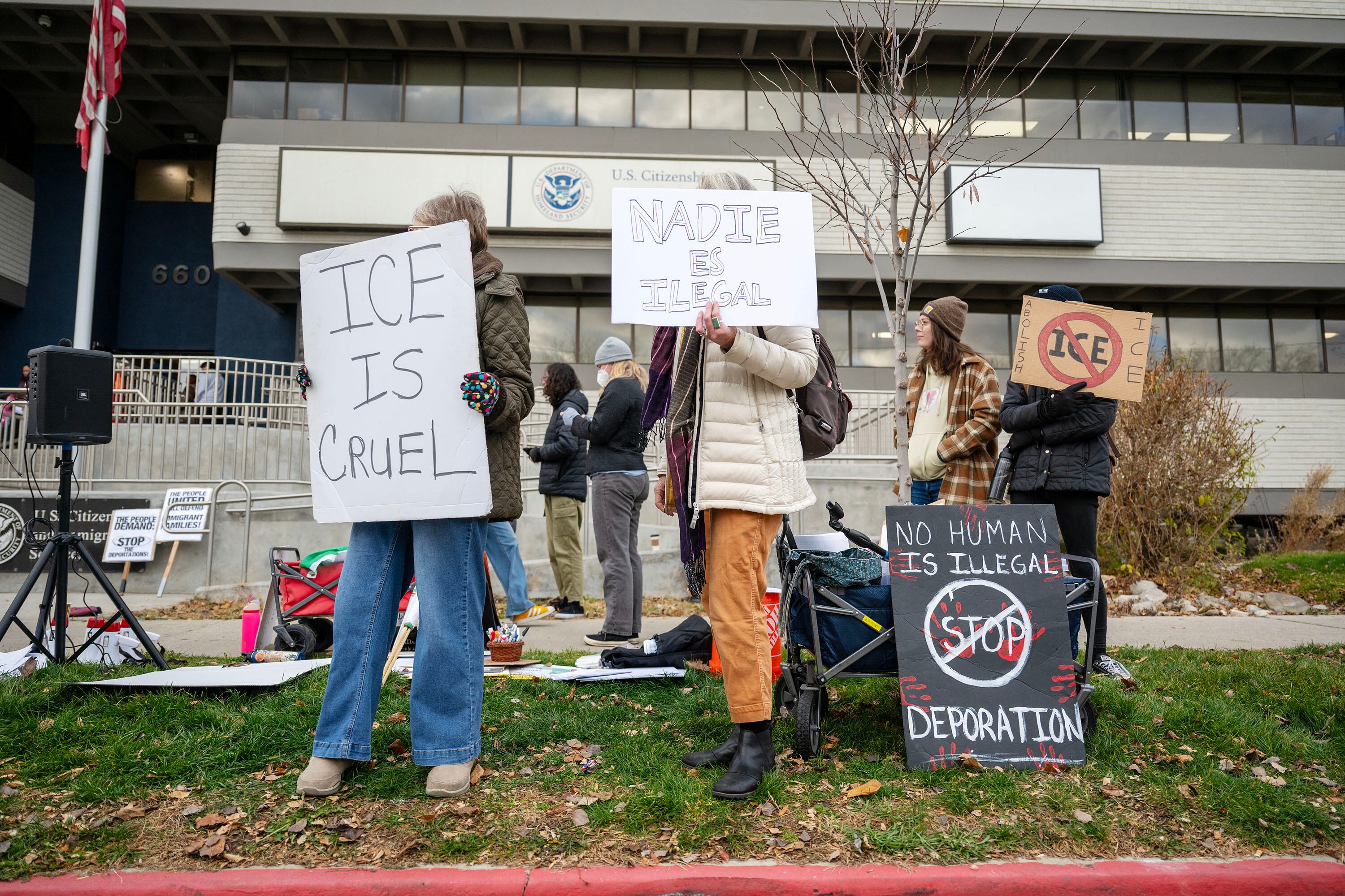 Protesters gather in front of the U.S. Citizenship and Immigration Services (USCIS) field office in Salt Lake City on Dec. 8.