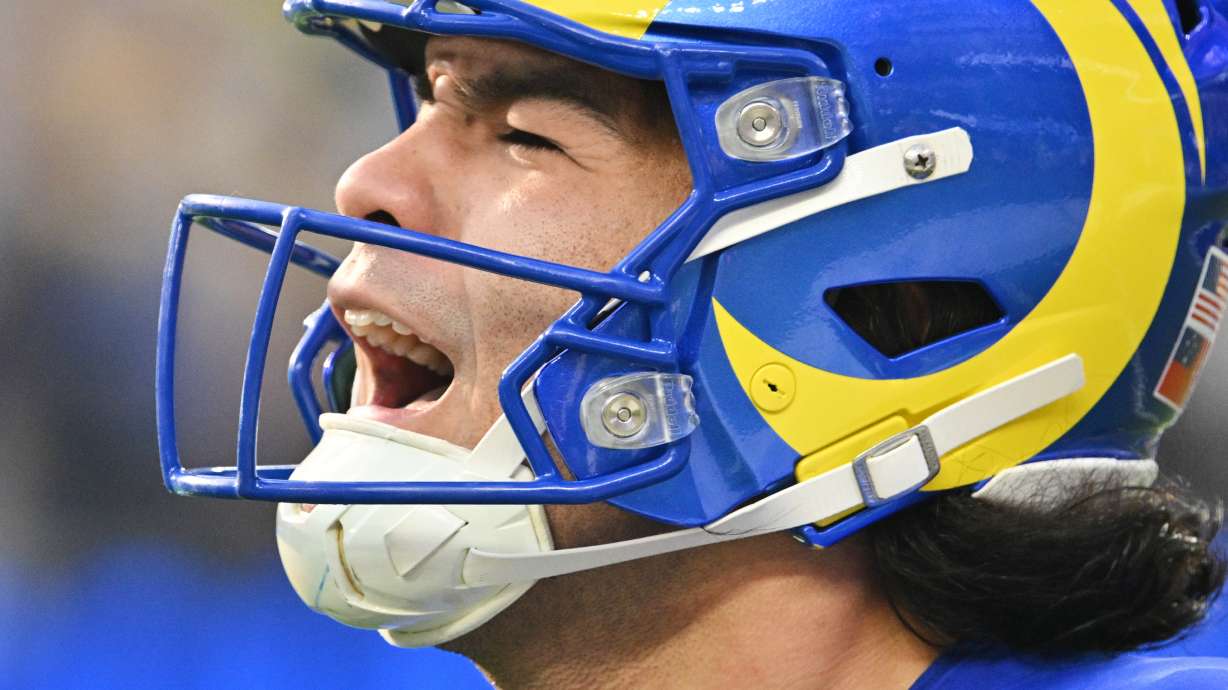 Los Angeles Rams wide receiver Puka Nacua (12) reacts after a first down during the first half of an NFL football game against the Detroit Lions, Sunday, Dec. 14, 2025, in Inglewood, Calif.