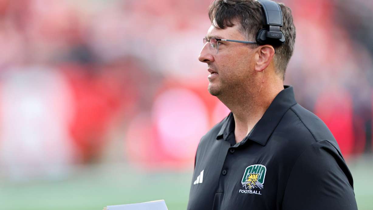 FILE - Ohio's head coach Brian Smith watches during an NCAA football game against Rutgers, Aug. 28, 2025, in Piscataway, N.J.