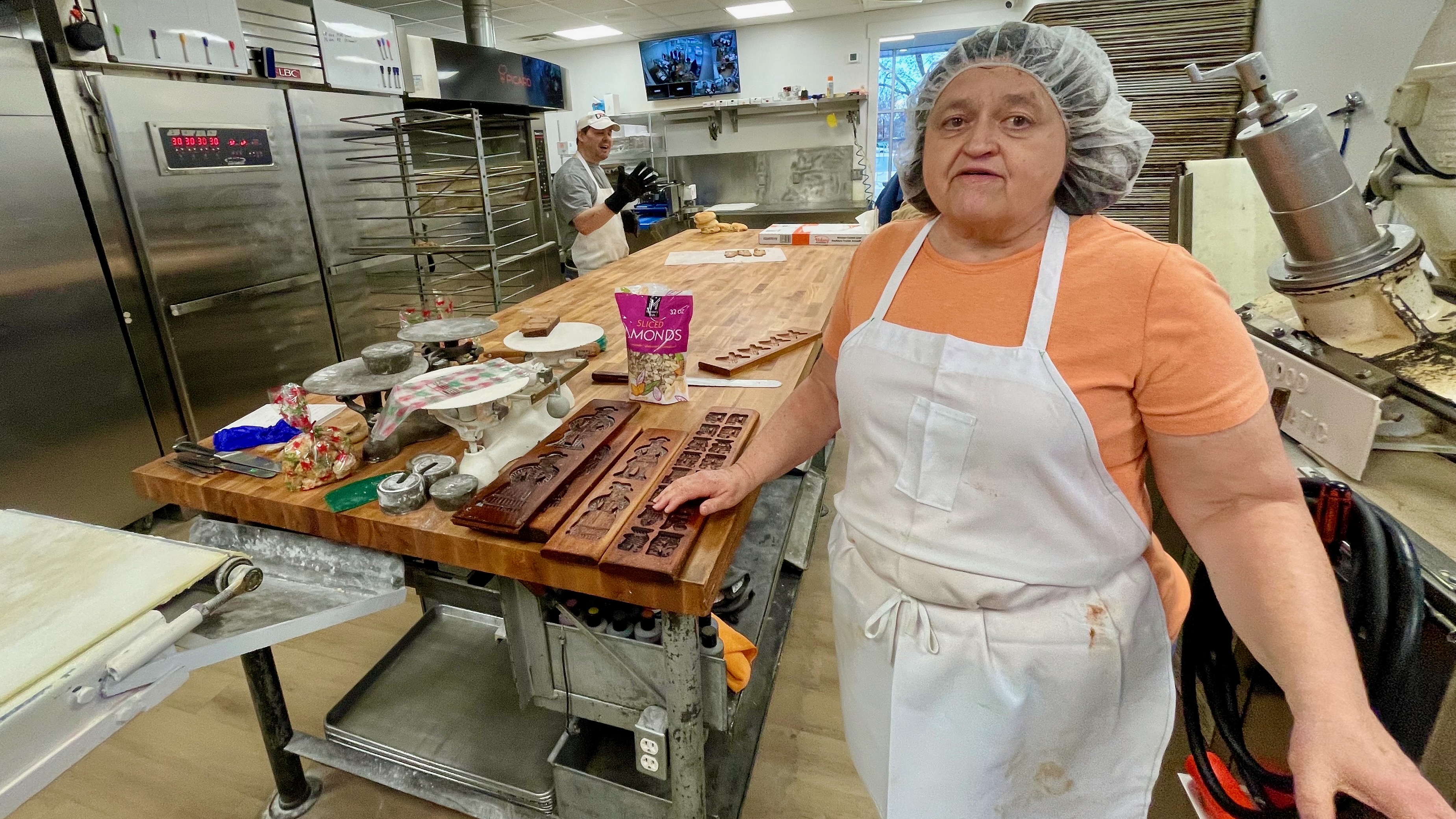 Valeen DeRyke of Topper Bakery in Ogden shows the wooden molds used to make speculaas cookies on Wednesday. The locale is offering its Christmastime treats for the first time in five years.