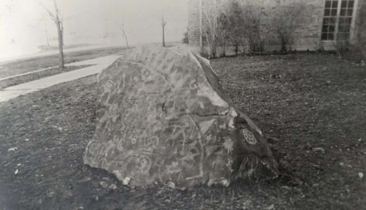 An undated photo of the petroglyph rock placed outside of the 1st Ward meetinghouse in Tremonton. The rock was taken from land near the Utah-Idaho border in the 1940s and brought back to Tremonton.