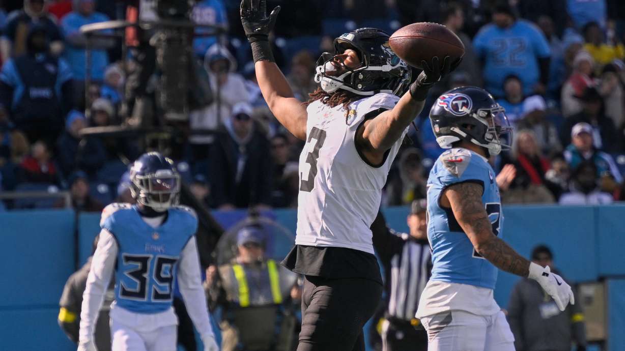 Jacksonville Jaguars wide receiver Jakobi Meyers (3) celebrates after scoring a touchdown on a pass play against the Tennessee Titans during the first half of an NFL football game Sunday, Nov. 30, 2025, in Nashville, Tenn.