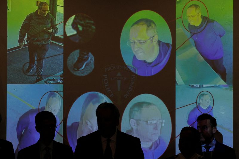 Images of the shooter at Brown University, identified by authorities as Claudio Neves Valente, are displayed during a press conference as civic leaders and law enforcement announce Valente has been found dead, in Providence, R.I., Thursday. Police combed back into Valente's academic past to search for answers into the shooting.