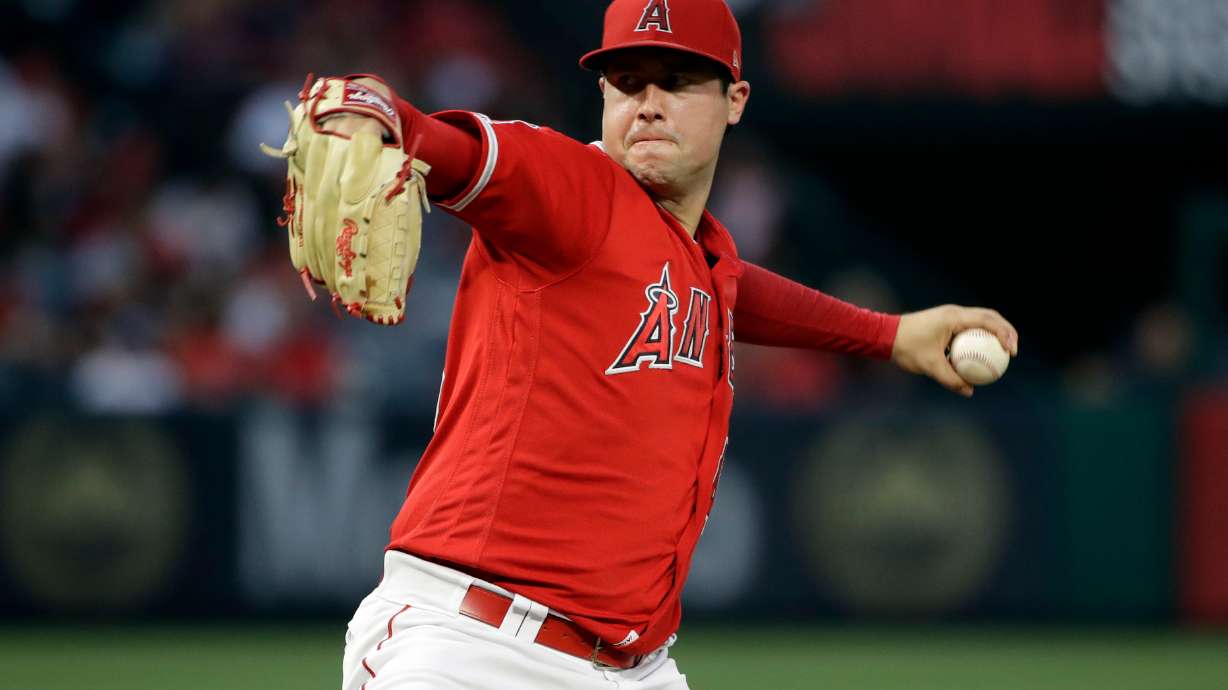 FILE - In this June 29, 2019, file photo, Los Angeles Angels starting pitcher Tyler Skaggs throws to an Oakland Athletics batter during a baseball game in Anaheim, Calif.