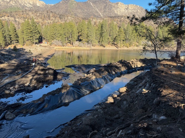 The channel being built to route water around the Pine Valley reservoir is shown. A wildfire and flooding led to the Pine Valley closure through the 2026 season, officials announced Friday.