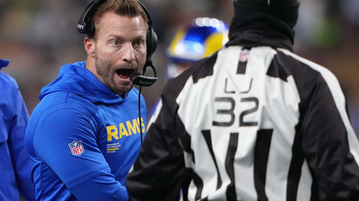 Los Angeles Rams head coach Sean McVay reacts as offensive lineman Kevin Dotson lies on the field after a play during the first half of an NFL football game against the Seattle Seahawks, Thursday, Dec. 18, 2025, in Seattle.
