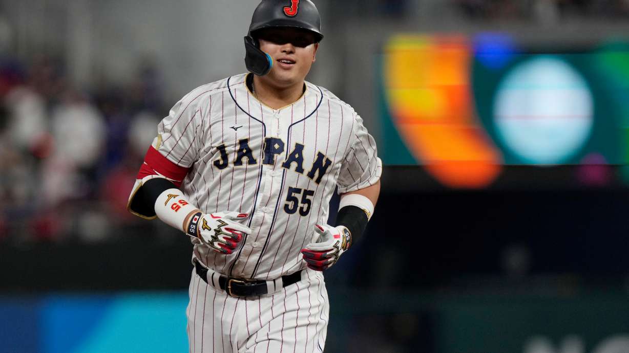 FILE - Japan's Munetaka Murakami rounds the bases after hitting a home run during the second inning of a World Baseball Classic game against the U.S., March 21, 2023, in Miami.
