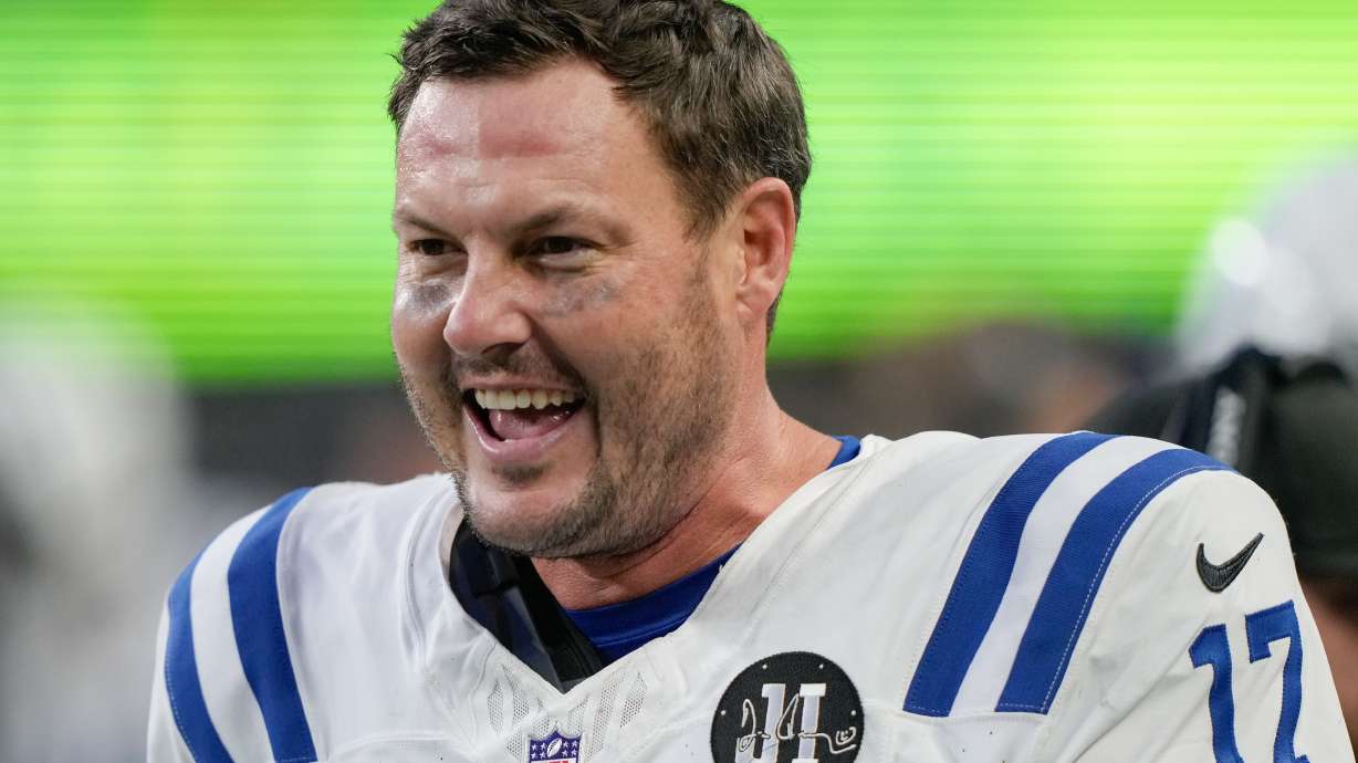 Indianapolis Colts quarterback Philip Rivers reacts during the second half of an NFL football game against the Seattle Seahawks, Sunday, Dec. 14, 2025, in Seattle.