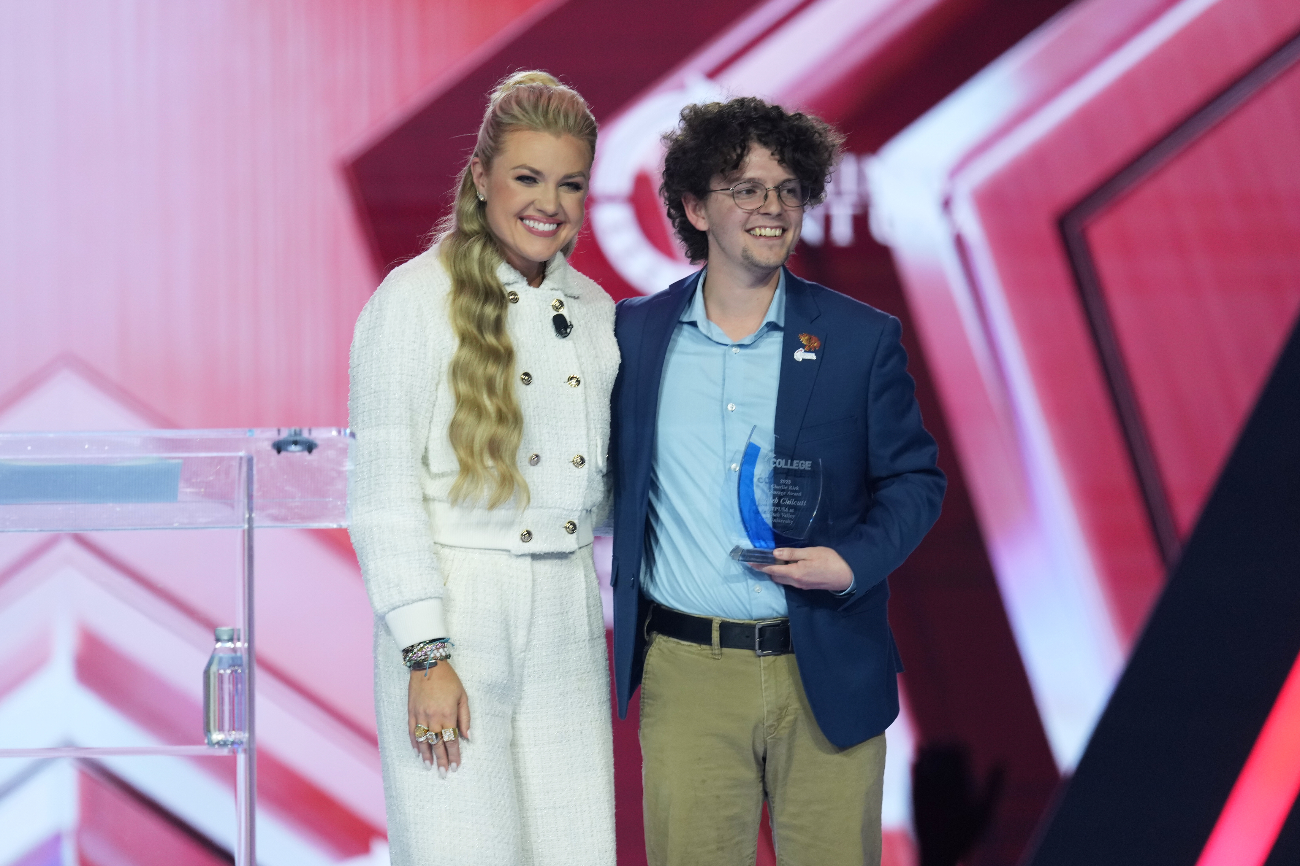 Utah Valley University student receives an award from Erika Kirk