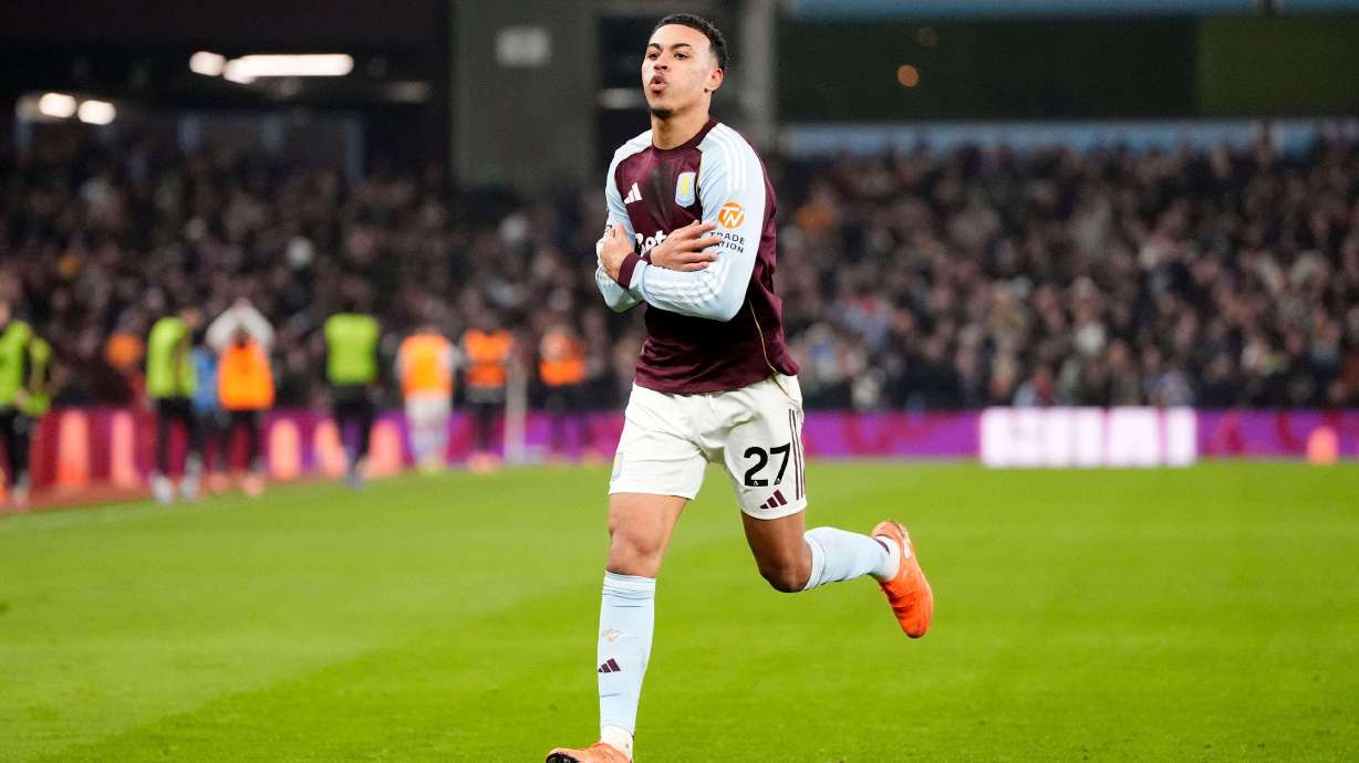 Aston Villa's Morgan Rogers celebrates after scoring their side's second goal of the game during the Premier League soccer match between Aston Villa and Manchester United, in Birmingham, England, Sunday Dec. 21, 2025.
