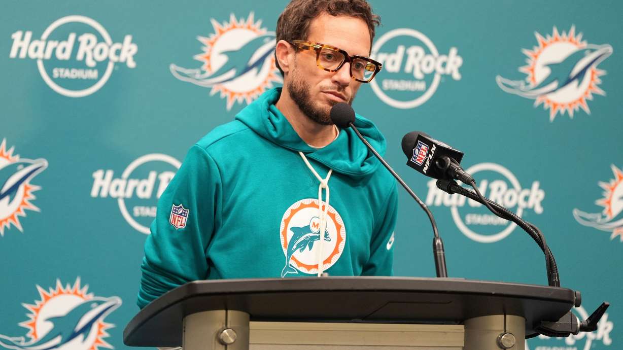 Miami Dolphins head coach Mike McDaniel ponders a question at news conference following a loss to the Cincinnati Bengals in an NFL football game, Sunday, Dec. 21, 2025, in Miami Gardens, Fla.