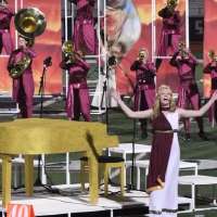 Musician surprises Herriman High School marching band while on tour