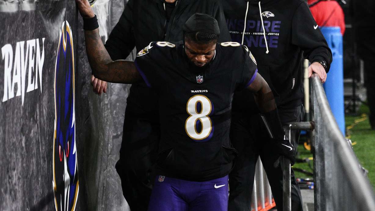 Baltimore Ravens quarterback Lamar Jackson (8) leaves the field during the first half of an NFL football game against the New England Patriots, Sunday, Dec. 21, 2025, in Baltimore.