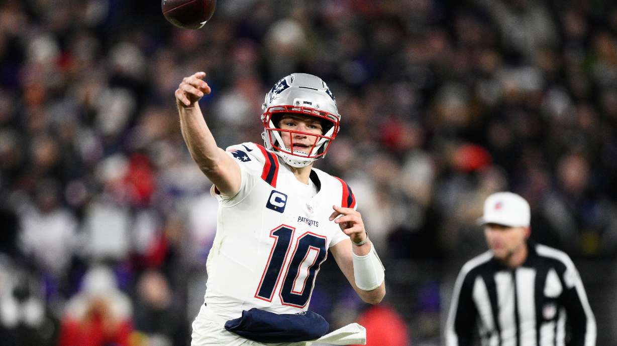 New England Patriots quarterback Drake Maye (10) passes against the Baltimore Ravens during the first half of an NFL football game, Sunday, Dec. 21, 2025, in Baltimore.