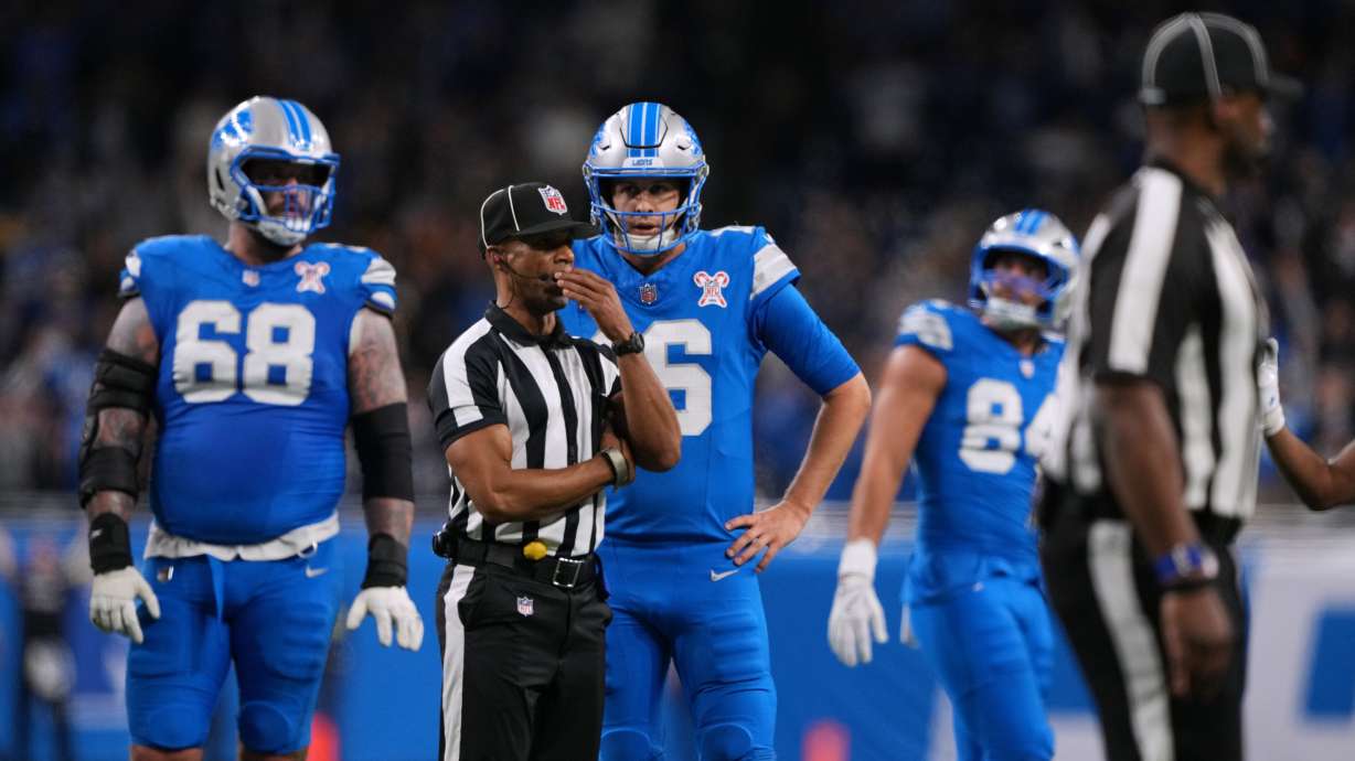 Detroit Lions' Jared Goff (16) waits for a call on the final play of an NFL football game against the Pittsburgh Steelers, Sunday, Dec. 21, 2025, in Detroit.