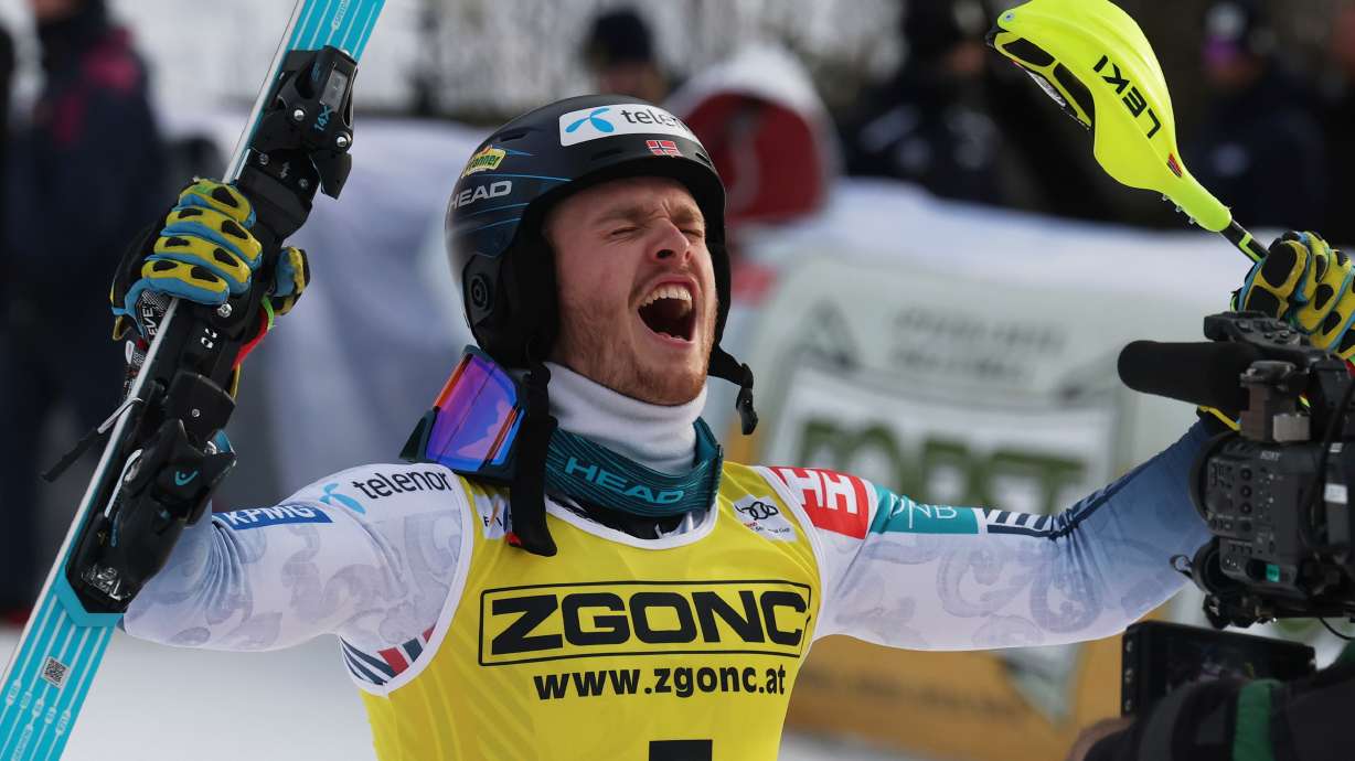Norway's Atle Lie McGrath celebrates at the finish area of an alpine ski, men's World Cup slalom, in Alta Badia, Italy, Monday, Dec. 22, 2025.