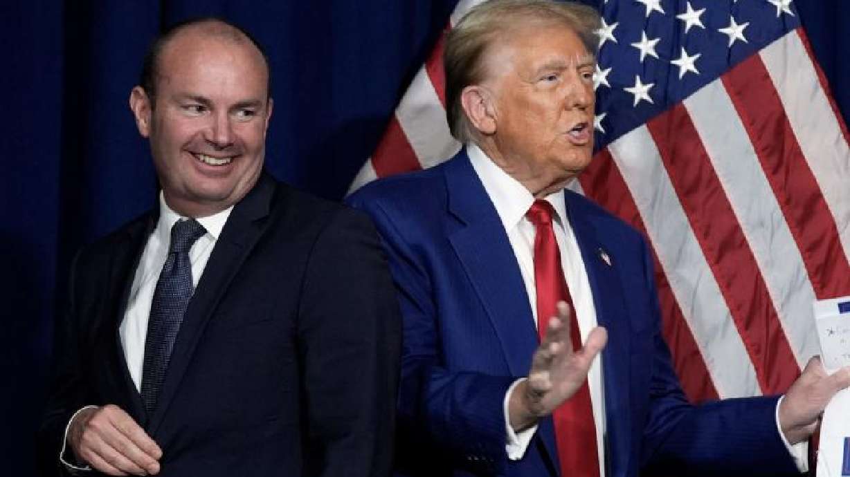Republican presidential nominee former President Donald Trump participates in a roundtable talks after a roundtable with faith leaders as Sen. Mike Lee, R-Utah, smiles Oct. 13, 2024, in Prescott Valley. Ariz.